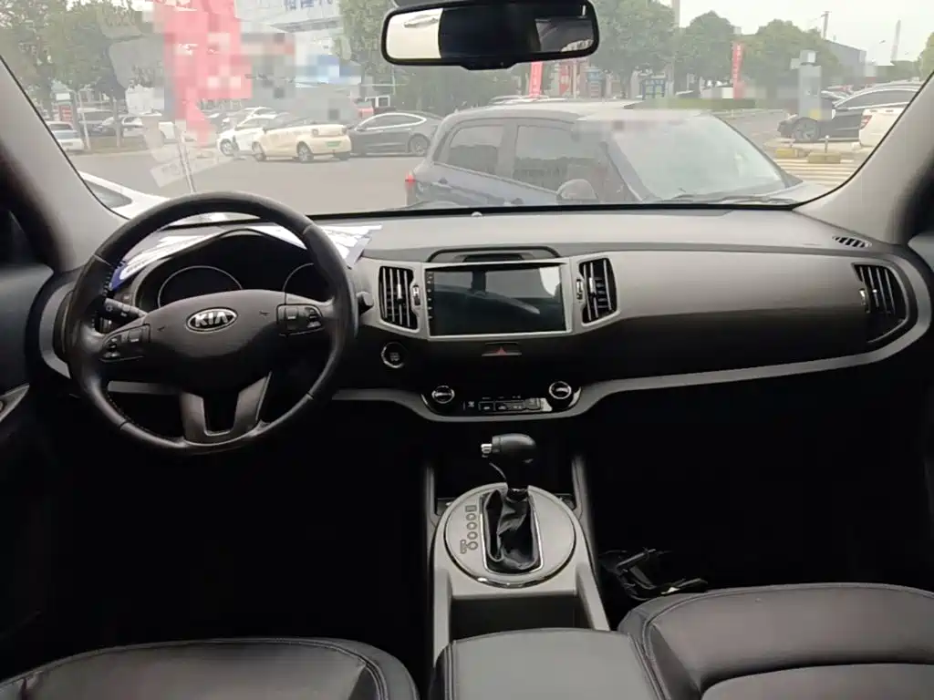 Kia Sportage — фото 10