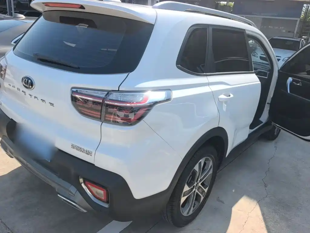 Kia Sportage — фото 7