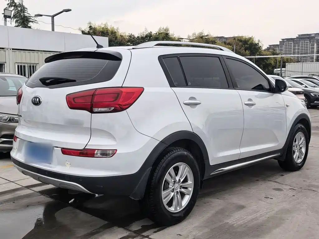 Kia Sportage — фото 7