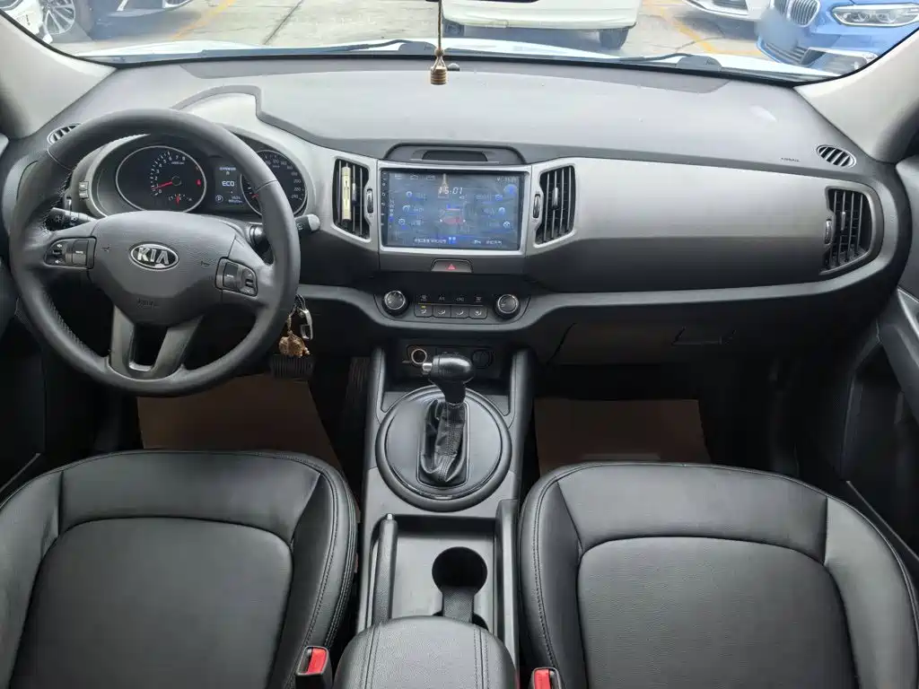 Kia Sportage — фото 8
