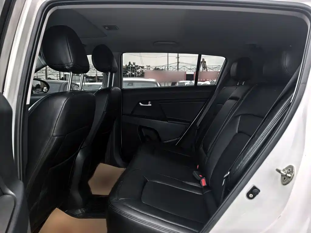 Kia Sportage — фото 10