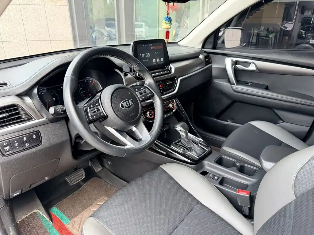 Kia Sportage — фото 11