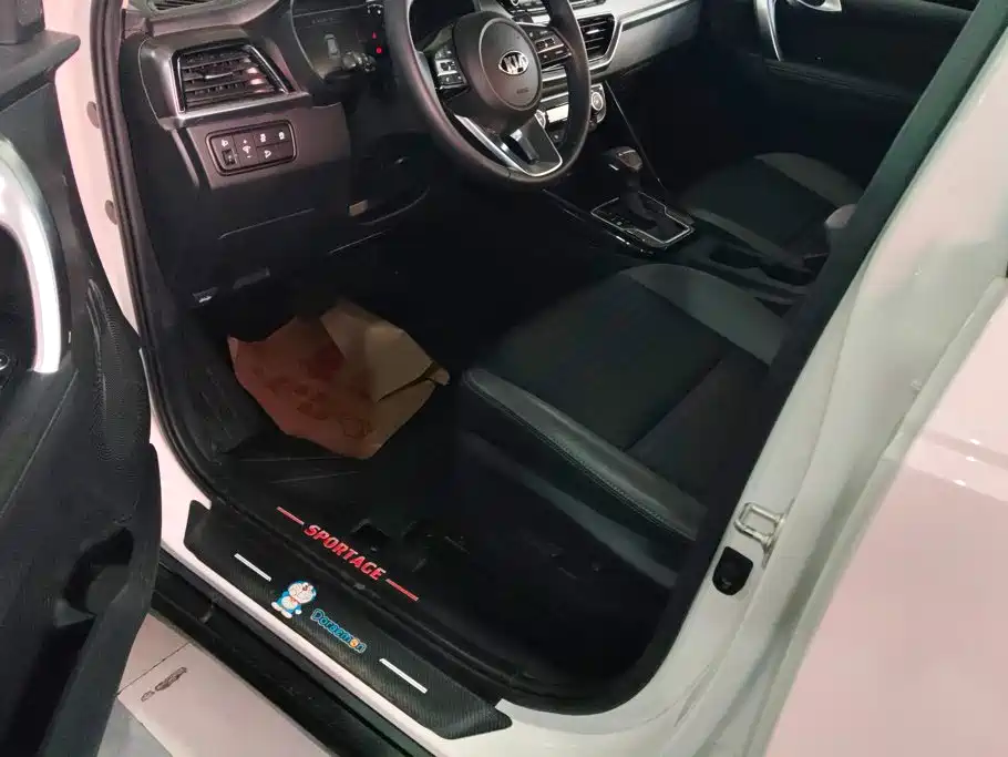 Kia Sportage — фото 9