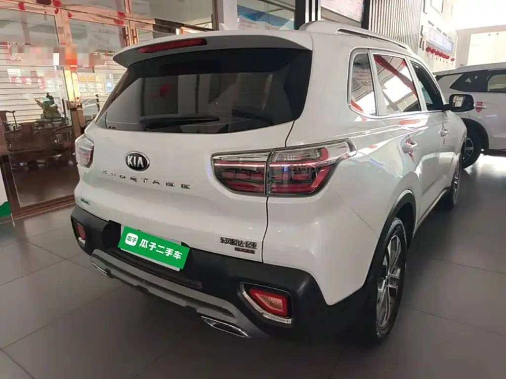 Kia Sportage — фото 7