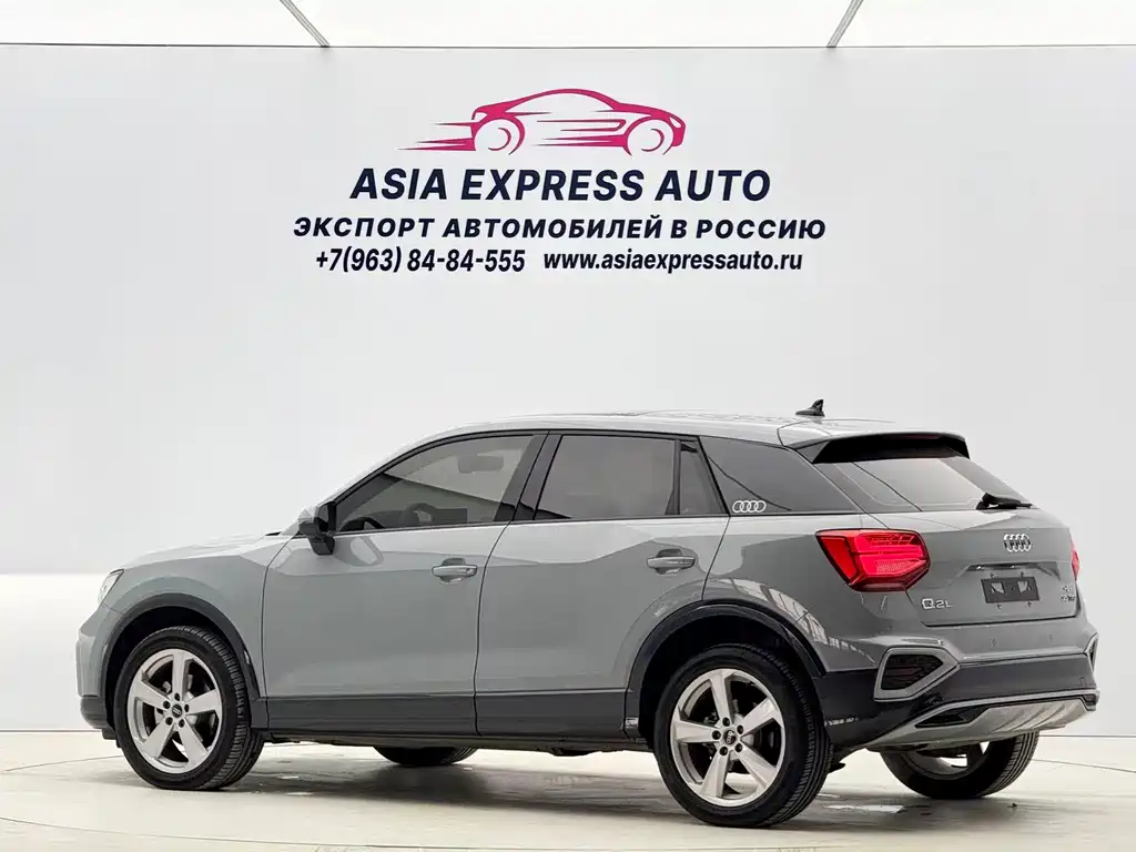 Audi Q2L — фото 6