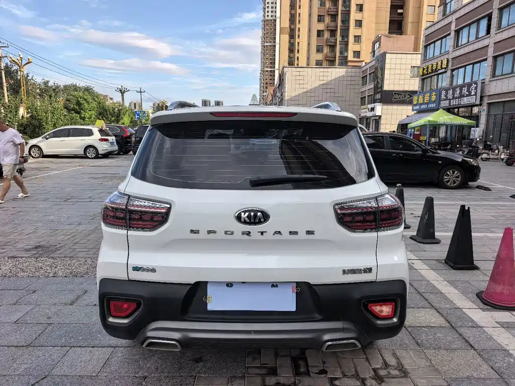 Kia Sportage — фото 8