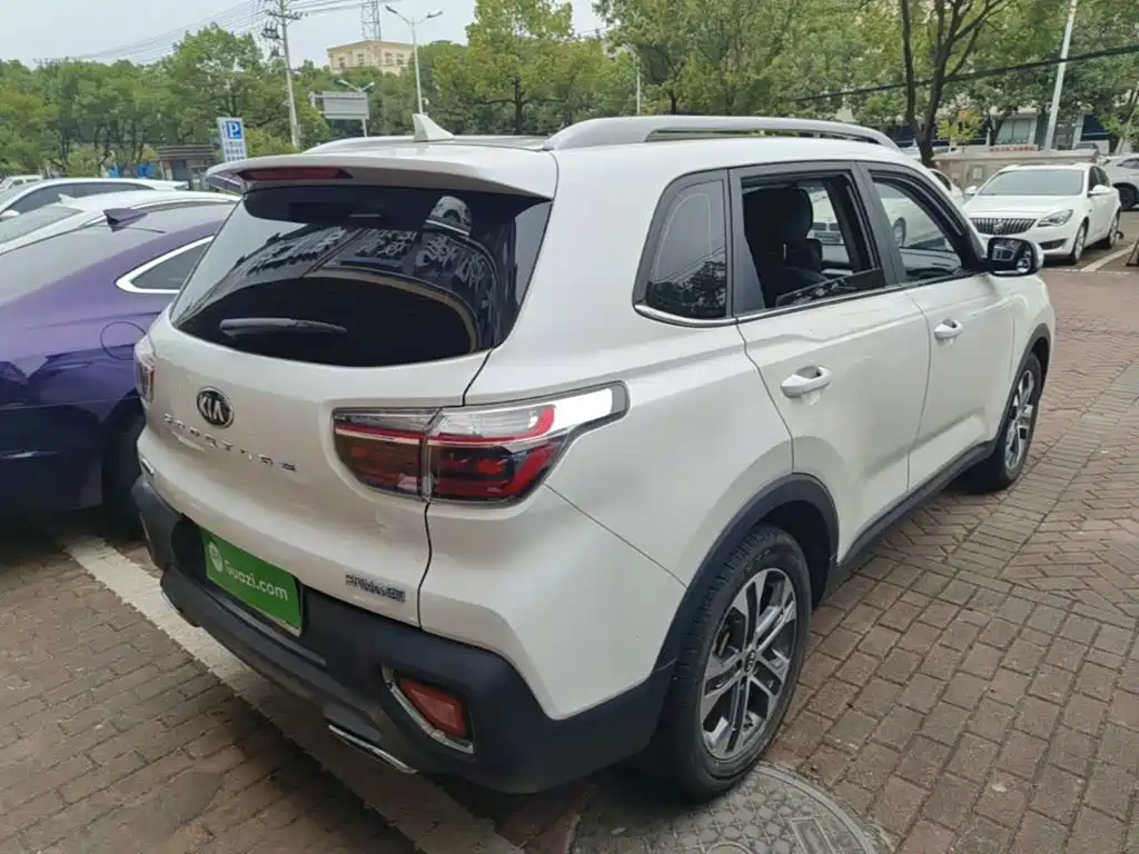 Kia Sportage — фото 7