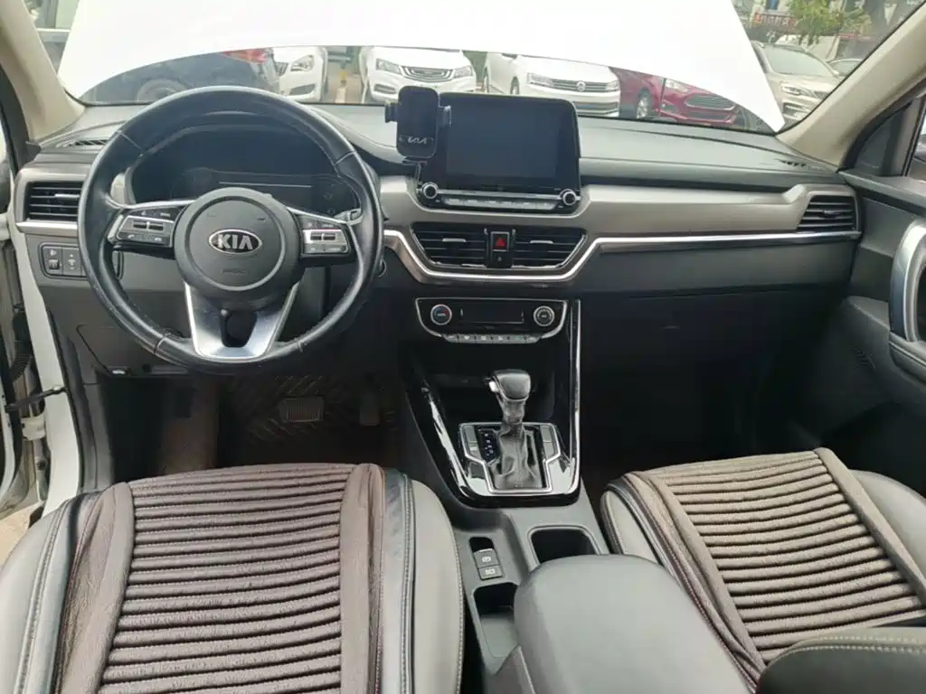 Kia Sportage — фото 10