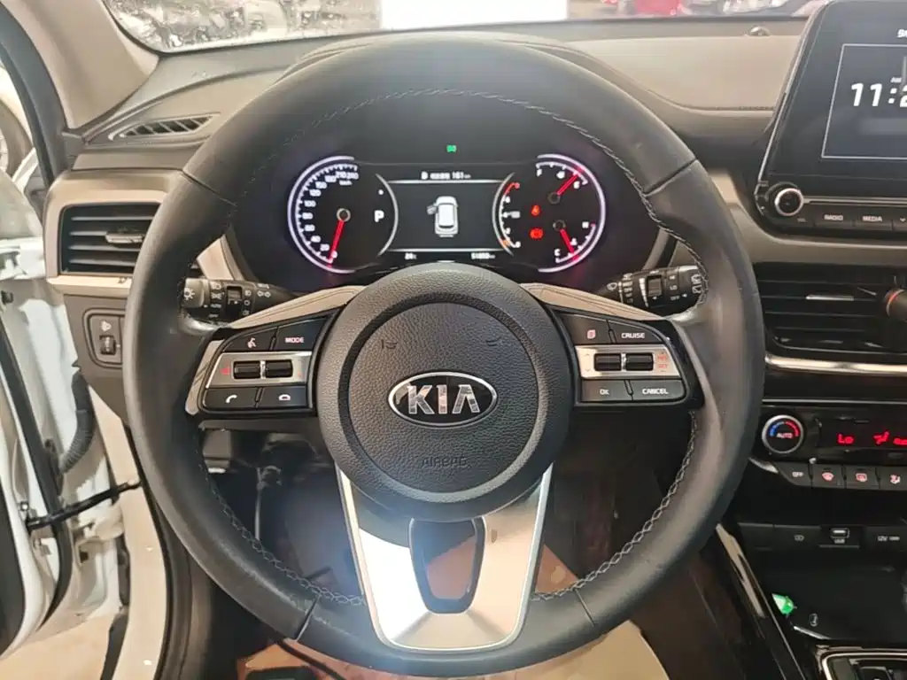 Kia Sportage — фото 11
