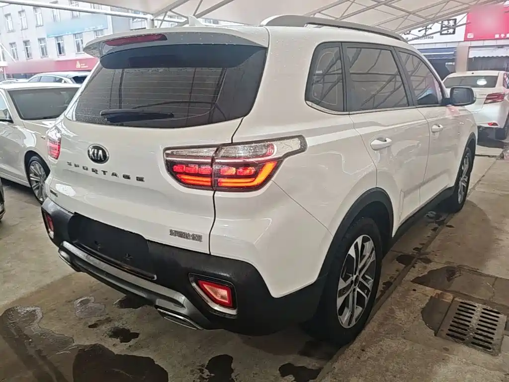 Kia Sportage — фото 7