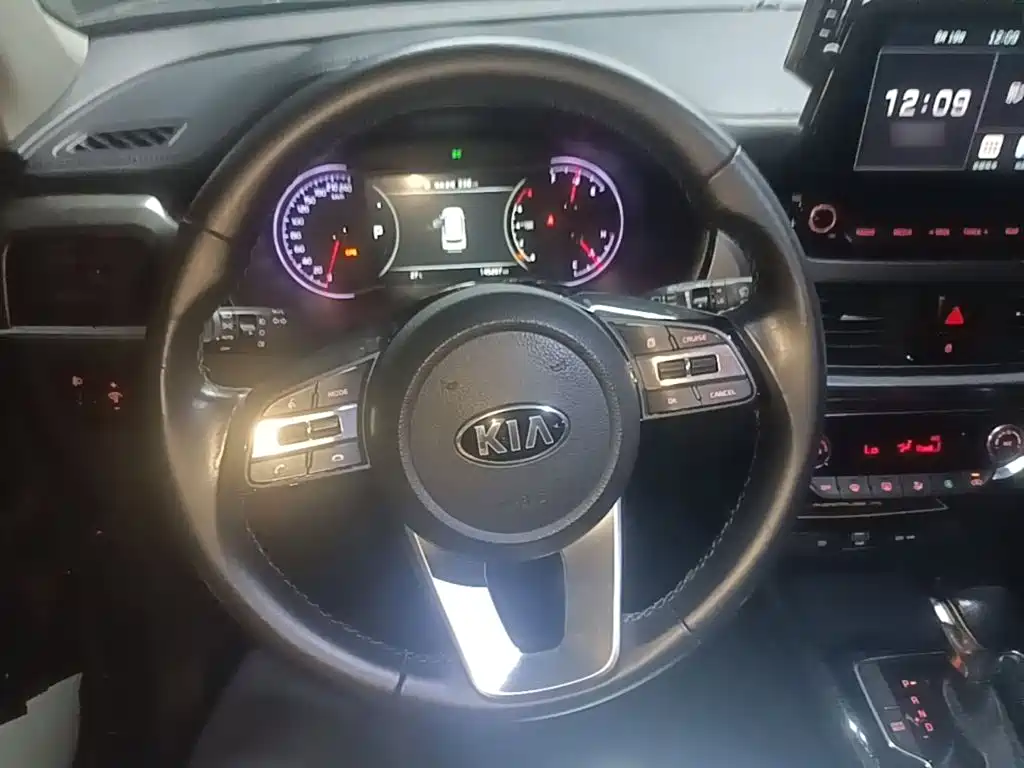 Kia Sportage — фото 11