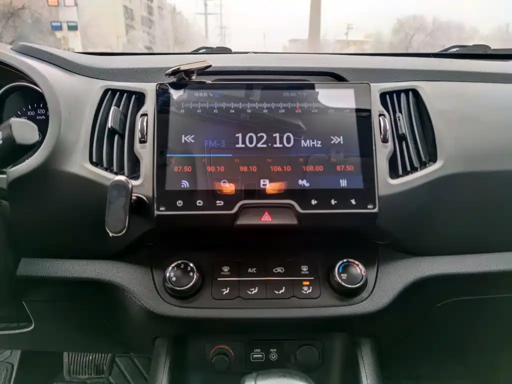 Kia Sportage — фото 13