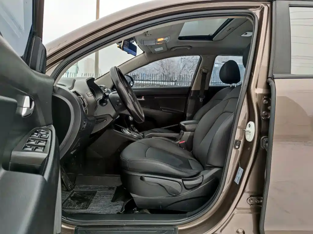 Kia Sportage — фото 7