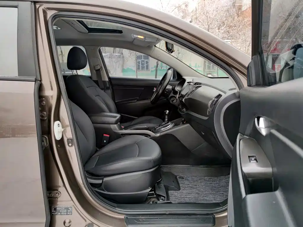 Kia Sportage — фото 8