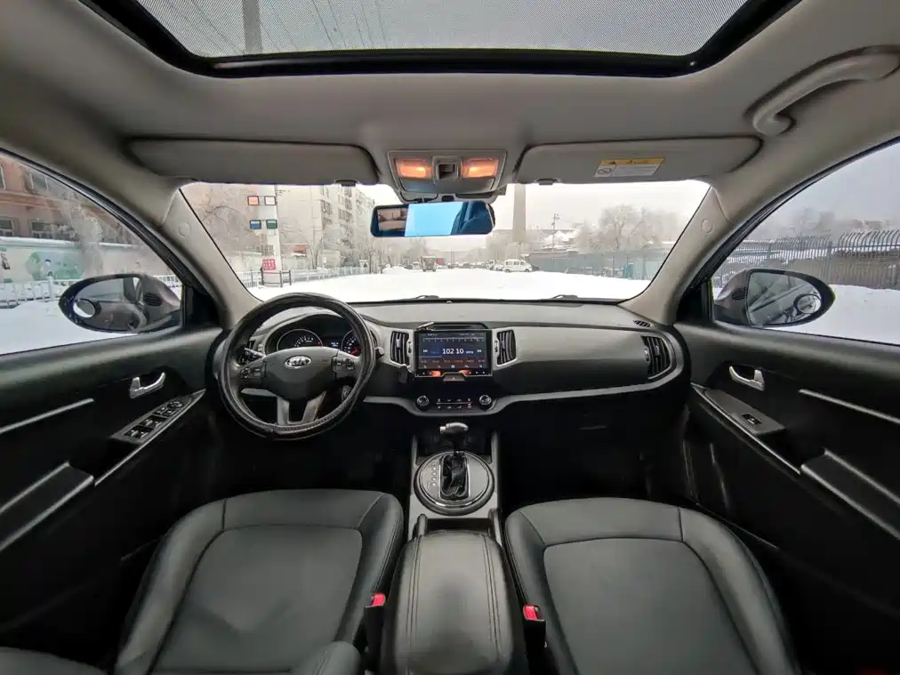 Kia Sportage — фото 9